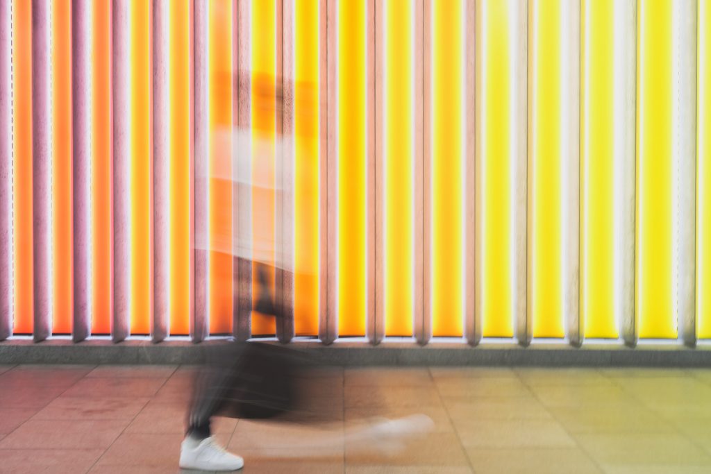 Testing for STIs during lockdown Blurred image of man walking