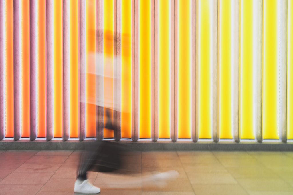 Blurred image of man walking